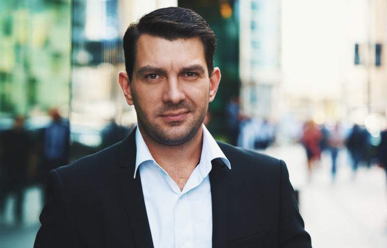 Confident businessman in the street