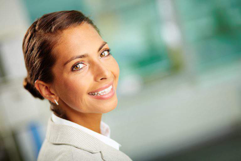 14470078 – portrait of successful business leader looking at camera with smile
